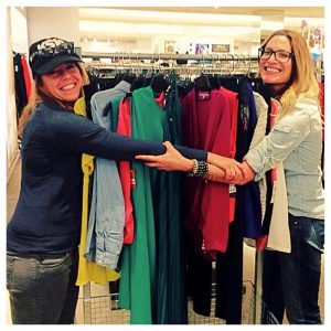 Client Pam and Rayne Parvis, personal stylist posing with a rack full of purchases at Macy's in Sherman Oaks, CA.